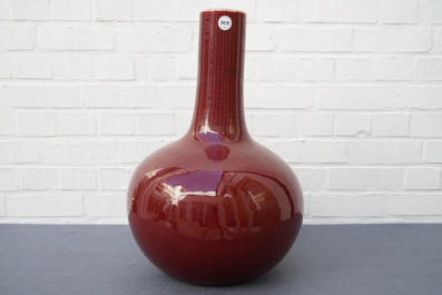 Three Chinese sang-de-boeuf-glazed bottle vases, 20th C.